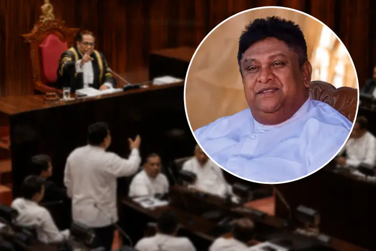 මන්ත්‍රී චාමරව සභා ගැබෙන් ඉවත් කරයි.